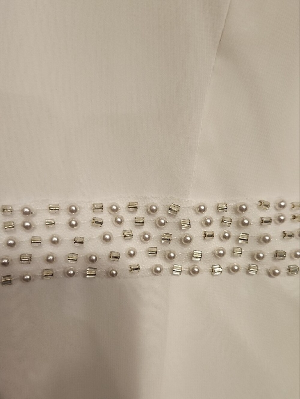 Minimalist White V-Neck Wedding Dress with Beaded Waist - Picture 3 of 16